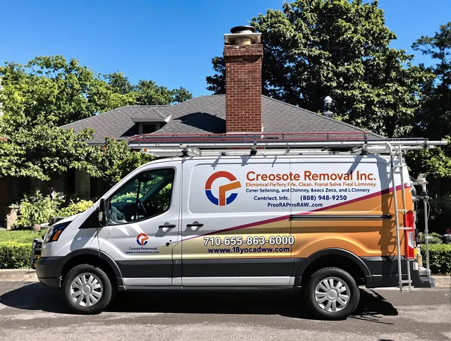 New Canaan Chimney Sweep technician removing creosote safely in New Canaan, CT