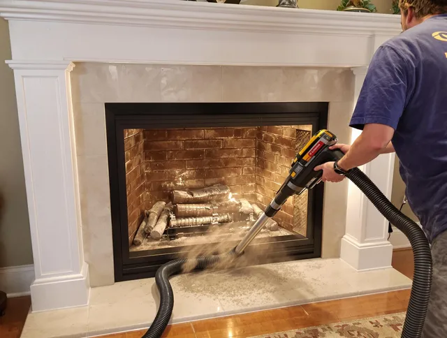 Fireplace cleaning performed by New Canaan Chimney Sweep in New Canaan, CT